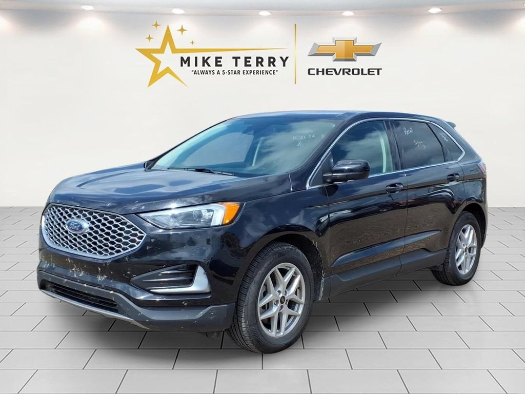 2024 Ford Edge SEL in Agate Black Met — front three-quarter view