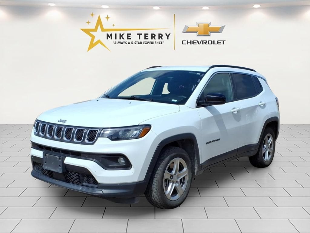 2024 Jeep Compass Latitude in Bright White Cl — front three-quarter view