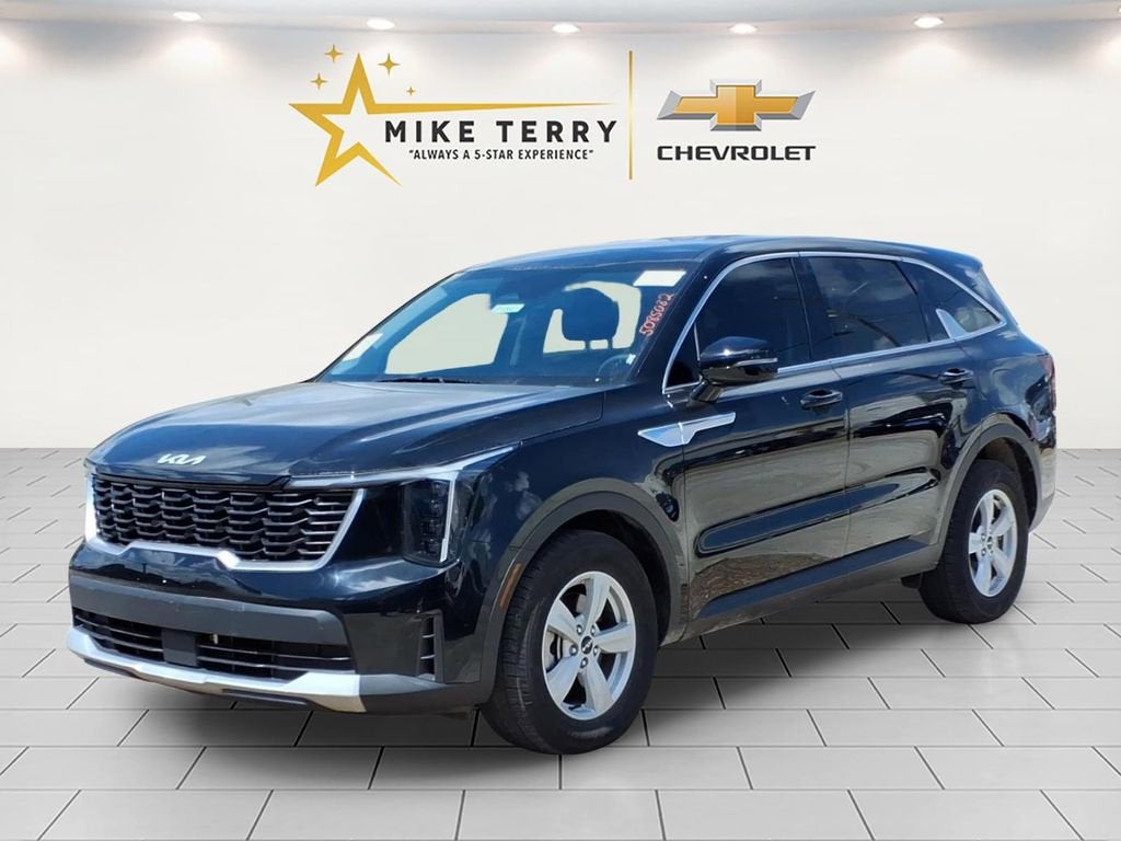2025 Kia Sorento LX in Black — front three-quarter view